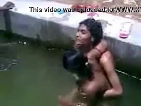 Nude indian woman swimming